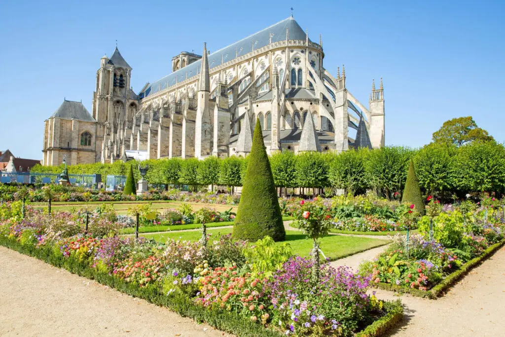 Swinger cruise, French cathedral and flower gardens on a sunny day