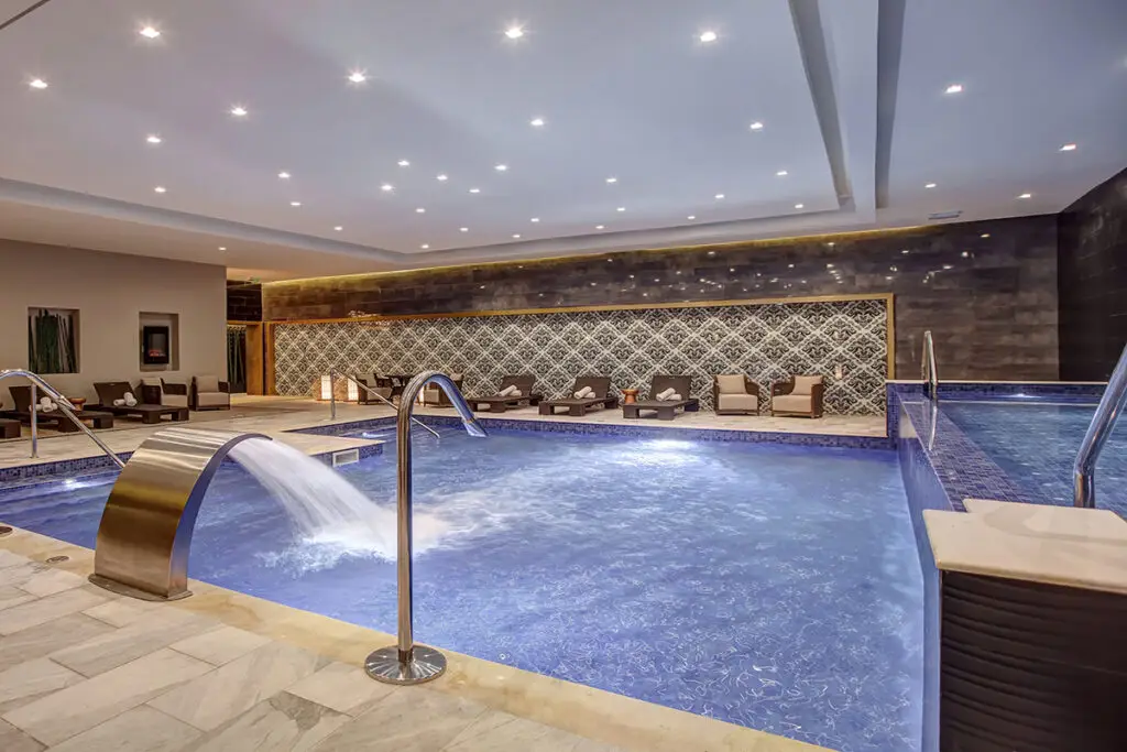 Luxury spa pool at Grand Lido Nude Luxury Resort Jamaica featuring hydrotherapy, relaxation lounges, and rejuvenating treatments