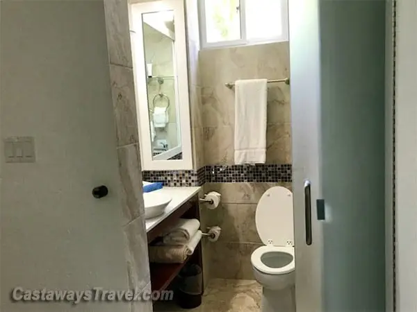 Bathroom in classic room at Hedonism II resort, featuring shower, sink, and toilet