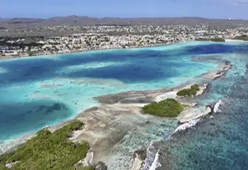 Aerial view of Oranjestad Aruba with turquoise water and sandy beaches