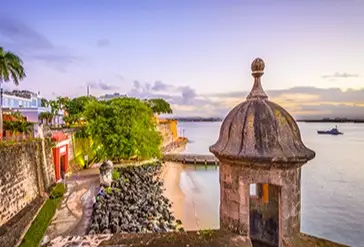 View of colorful Old San Juan with historic fortress overlooking the Caribbean Sea