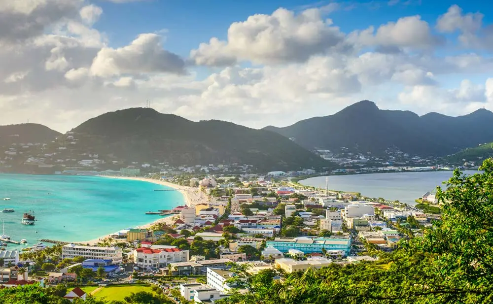 Aerial view of Philipsburg, St. Maarten, a top Caribbean stop for swinger cruise couples only, showing turquoise waters, sandy beaches, and the island’s Dutch-French charm.