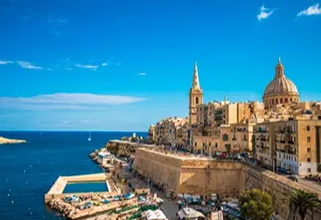 Panoramic view of Valletta Malta with historic harbor and domed churches, featured on Desire Mediterranean Cruise 2026