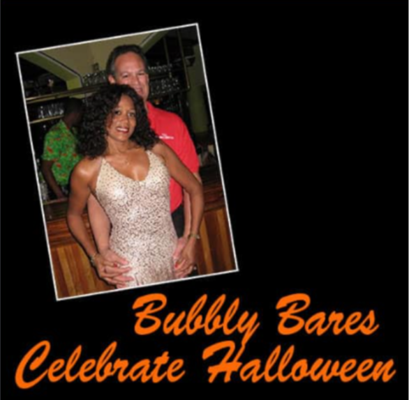 Host Couple celebrating Bubbly Bares Halloween night at Hedonism resort during Castaways Travel group trip