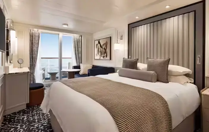 Concierge Level Veranda Stateroom on the Desire cruise swinger Asia 2028 featuring private balcony and premium amenities