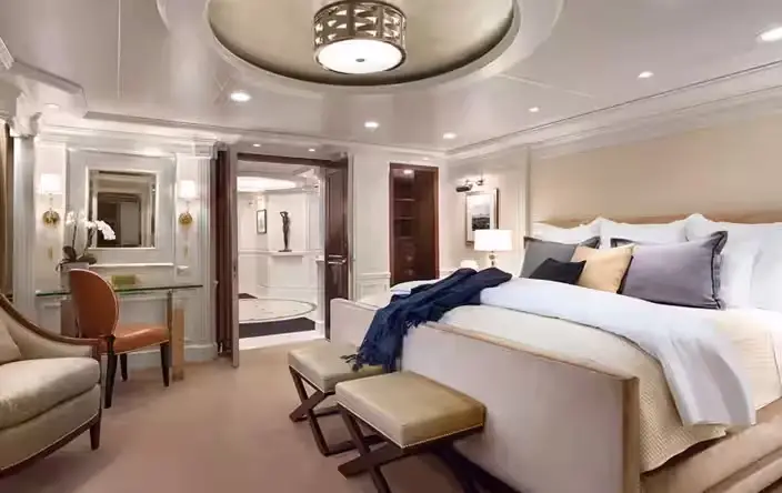 Owner’s Suite luxury accommodation on the Desire cruise swinger Asia 2028 featuring expansive living space and ocean views