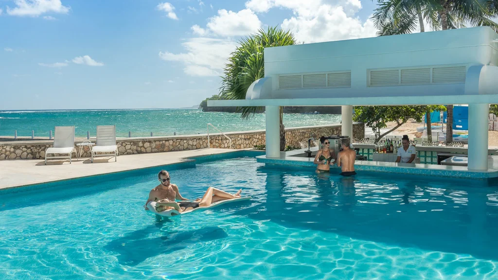 Couples Tower Isle Ocho Rios Jamaica pool overlooking the ocean, adults only all inclusive resort for honeymoon and anniversary travel