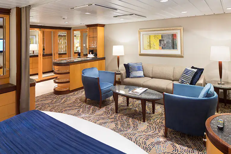 Grand suite one bedroom living area on Mariner of the Seas, Bliss Cruise February 2028 New Orleans adults only nude swinger cruise