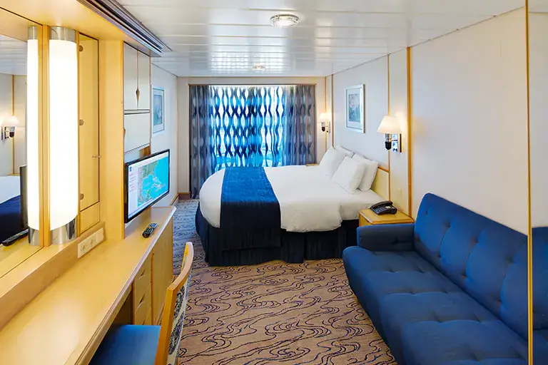 Panoramic ocean view stateroom with wide window and modern interior on Mariner of the Seas, Bliss Cruise February 2028 New Orleans adults only