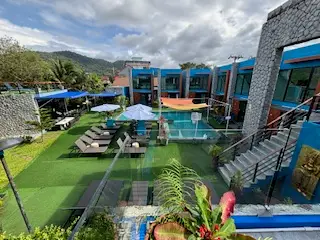 Courtyard and pool at Blue Peach Resort Phuket featuring nude resort Thailand deals and adults only accommodations