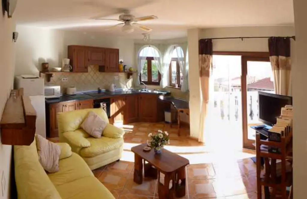 Nude resort Spain Fuerteventura Sun Club apartment accommodation with full kitchen, living area, and private balcony