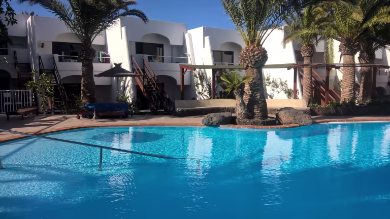 Nude resort Spain Monte Marina apartment accommodations surrounded by tropical gardens on Fuerteventura's Jandía Peninsula