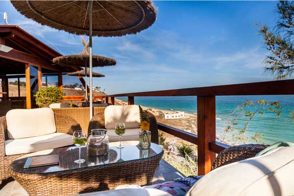 Nude resort Spain Monte Marina ocean view terrace overlooking the Atlantic Ocean and nearby naturist beaches on Fuerteventura