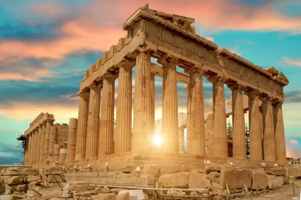 The Acropolis in Athens, Greece at sunset, featured on an adults only lifestyle group trip aboard Virgin Voyages Scarlet Lady sailing to Greece, Turkey, and Cairo in 2027.
