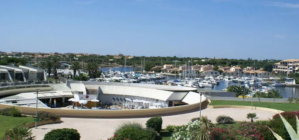 Port Ambonne accommodations overlooking the marina in Nude City France, located within Cap d'Agde Naturist Village.