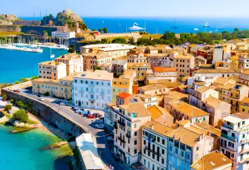 Historic waterfront in Corfu, Greece, featured on the Desire Cruise Mediterranean 2028 luxury adults only swinger cruise for couples.